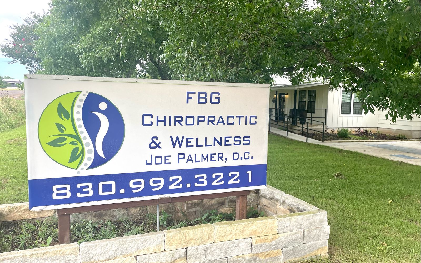 FBG Chiropractic and Wellness office and sign on West Highway 290 in Fredericksburg, TX